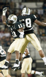 - Orlando, FL, U, . 29th Nov, 2013. S: Central Florida quarterback Blake  Bortles (5) and Central Florida offensive linesman Torrian Wilson (72)  after 2nd half NCAA football game action between the USF Bulls and the UCF  Knights. Central Florida defeated